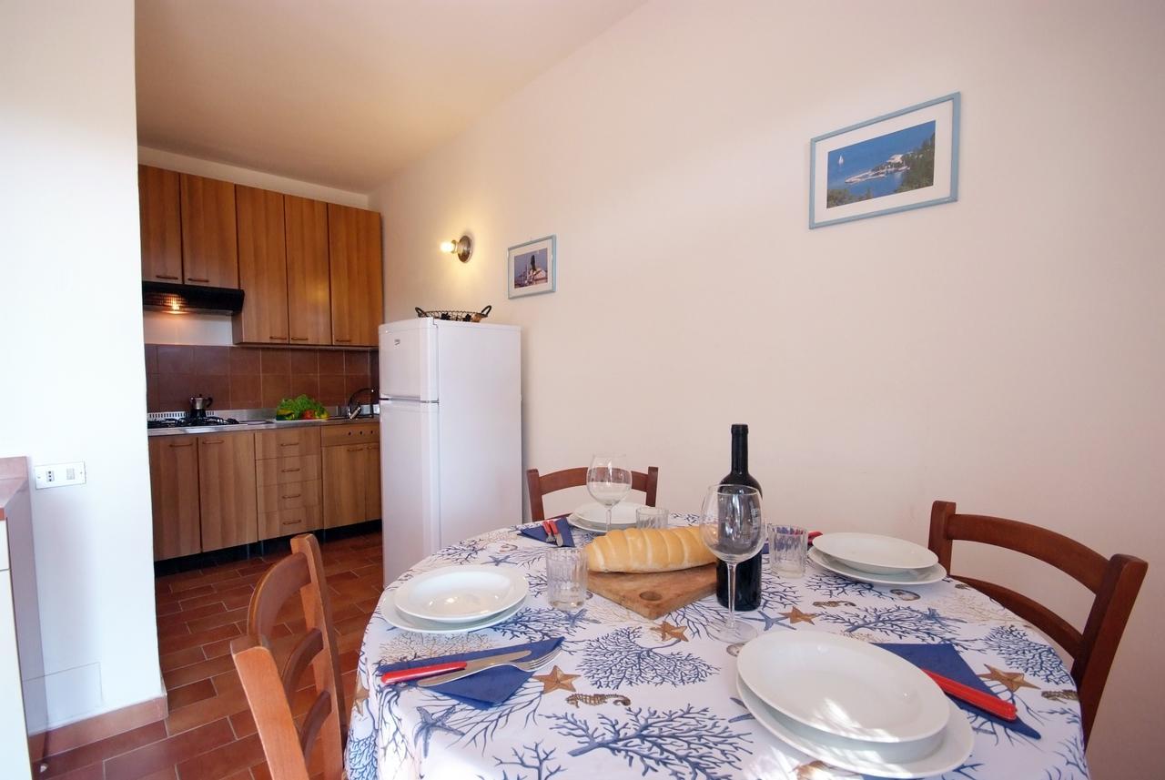 Residence Sud Est Porto Azzurro Bagian luar foto