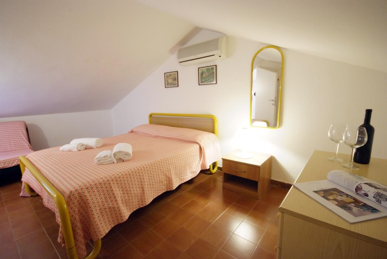 Residence Sud Est Porto Azzurro Bagian luar foto