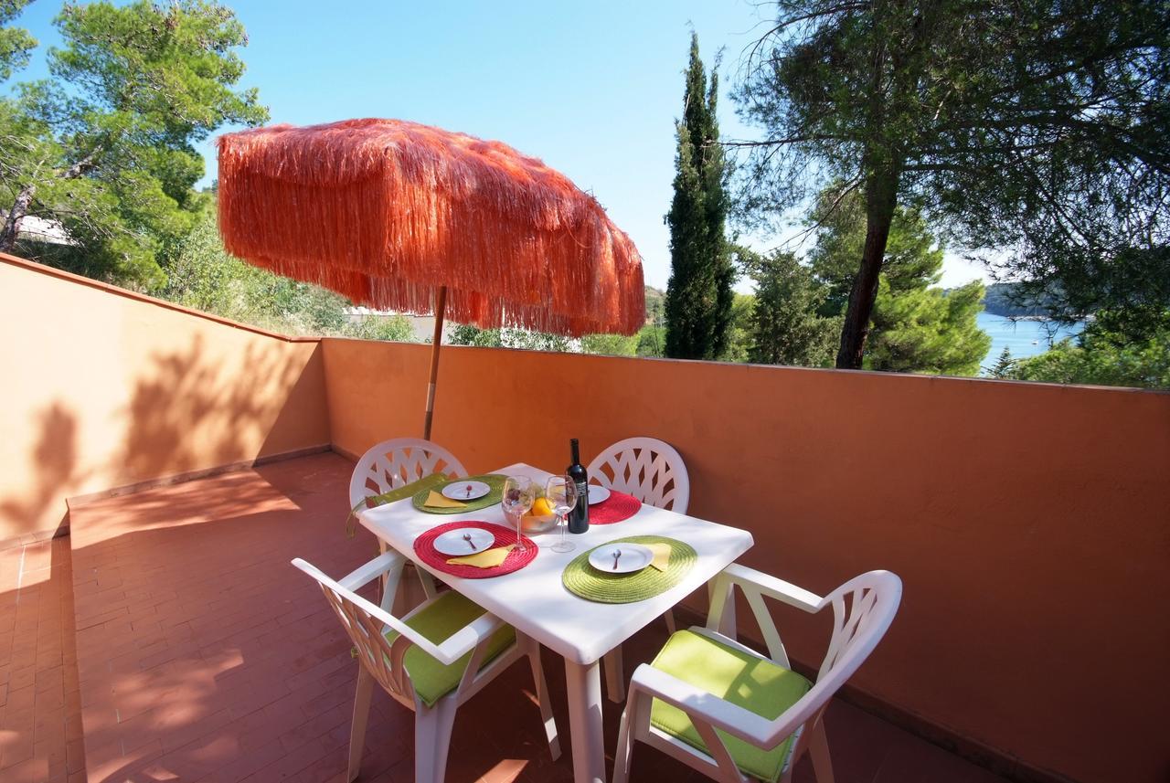 Residence Sud Est Porto Azzurro Bagian luar foto