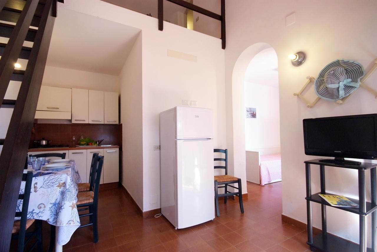 Residence Sud Est Porto Azzurro Bagian luar foto