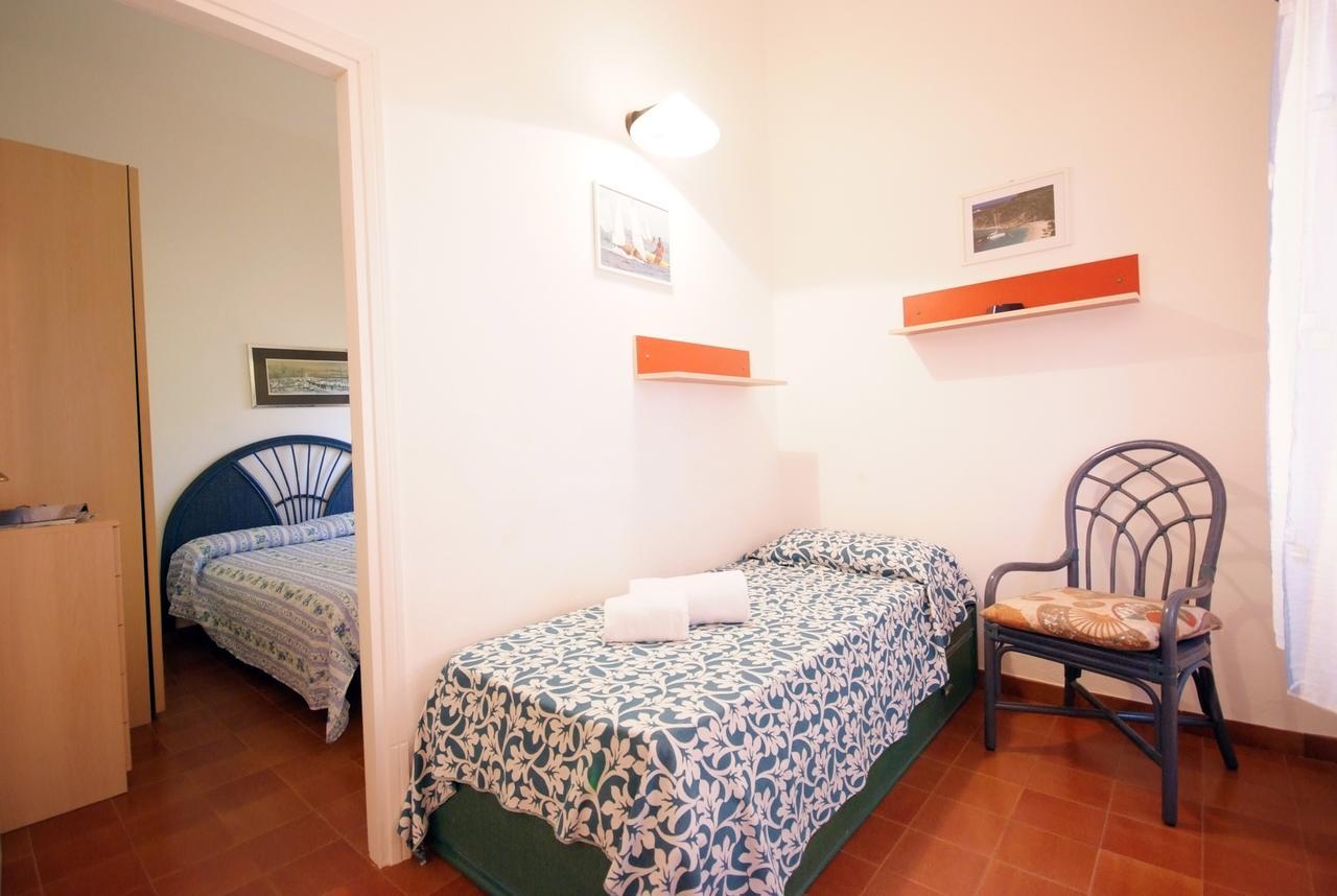 Residence Sud Est Porto Azzurro Bagian luar foto