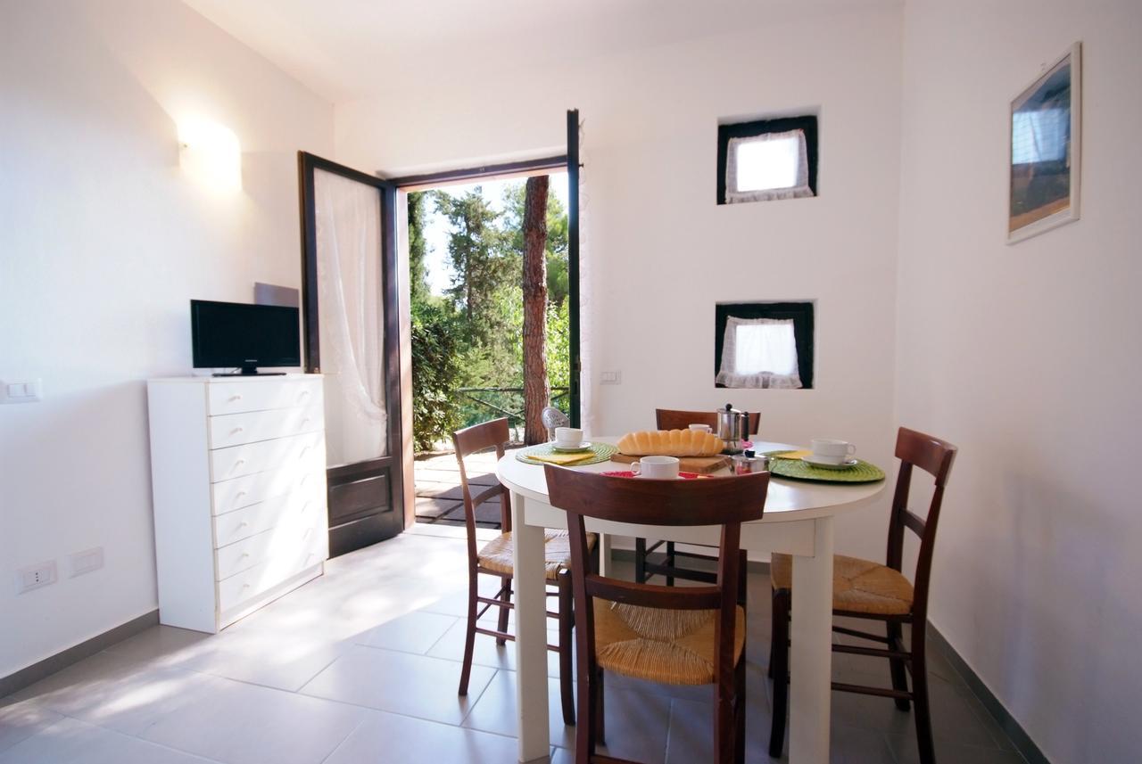 Residence Sud Est Porto Azzurro Bagian luar foto