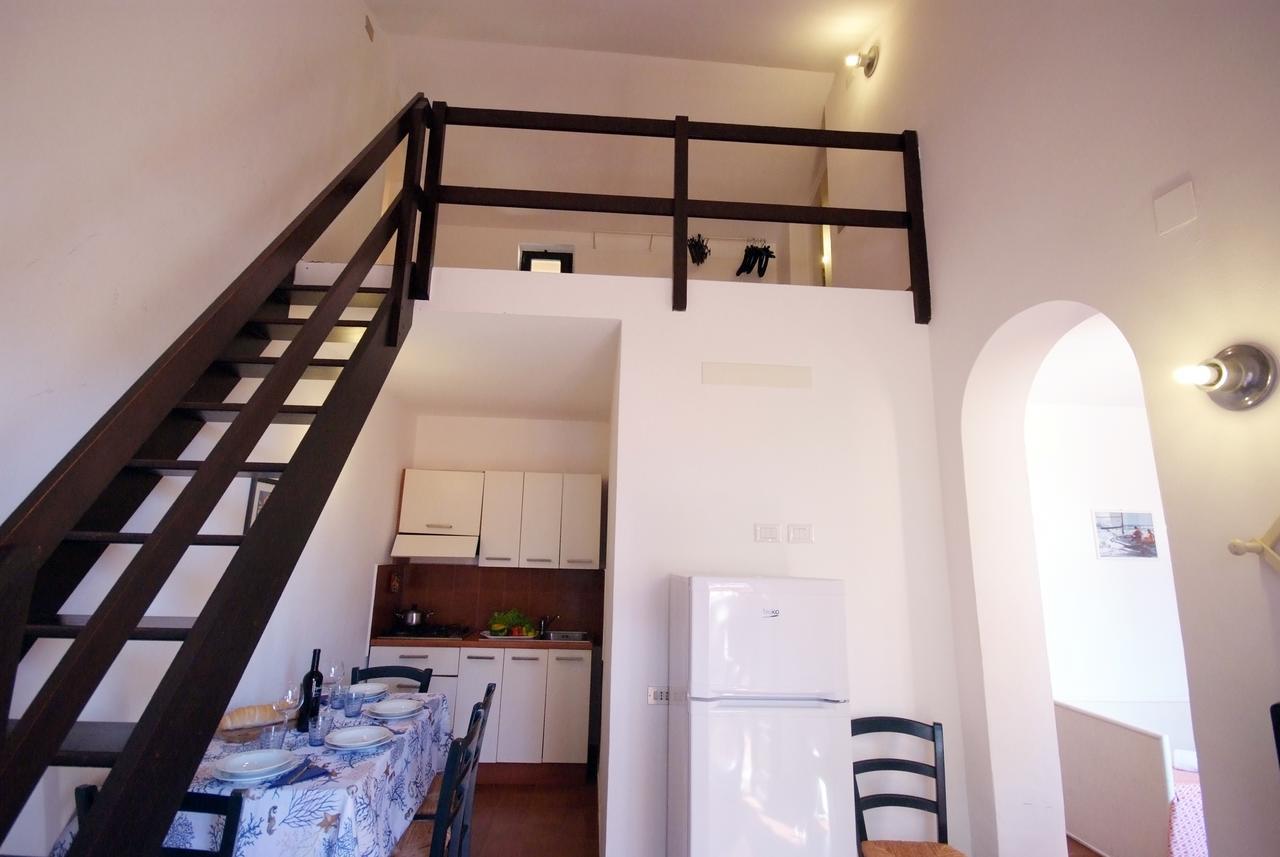 Residence Sud Est Porto Azzurro Bagian luar foto
