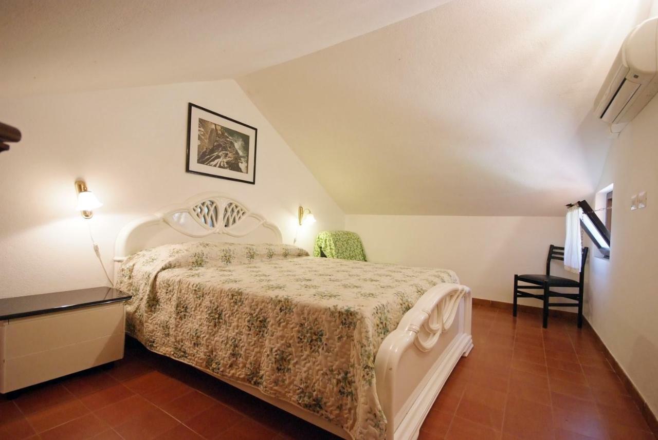 Residence Sud Est Porto Azzurro Bagian luar foto